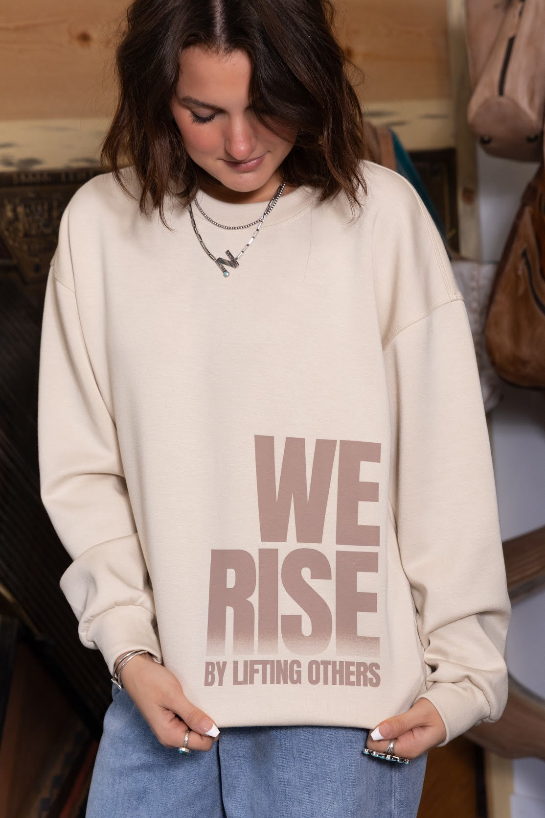 We Rise Long Sleeve Pull Over Sweatshirt