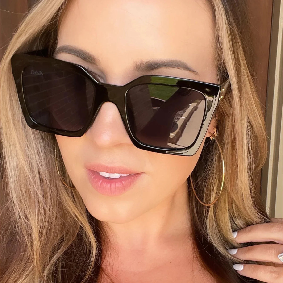 DAX Wylie in Black Sunglasses
